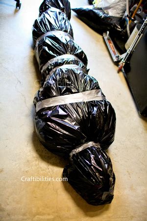 halloween fake body bag|halloween 13 foot skeleton body.